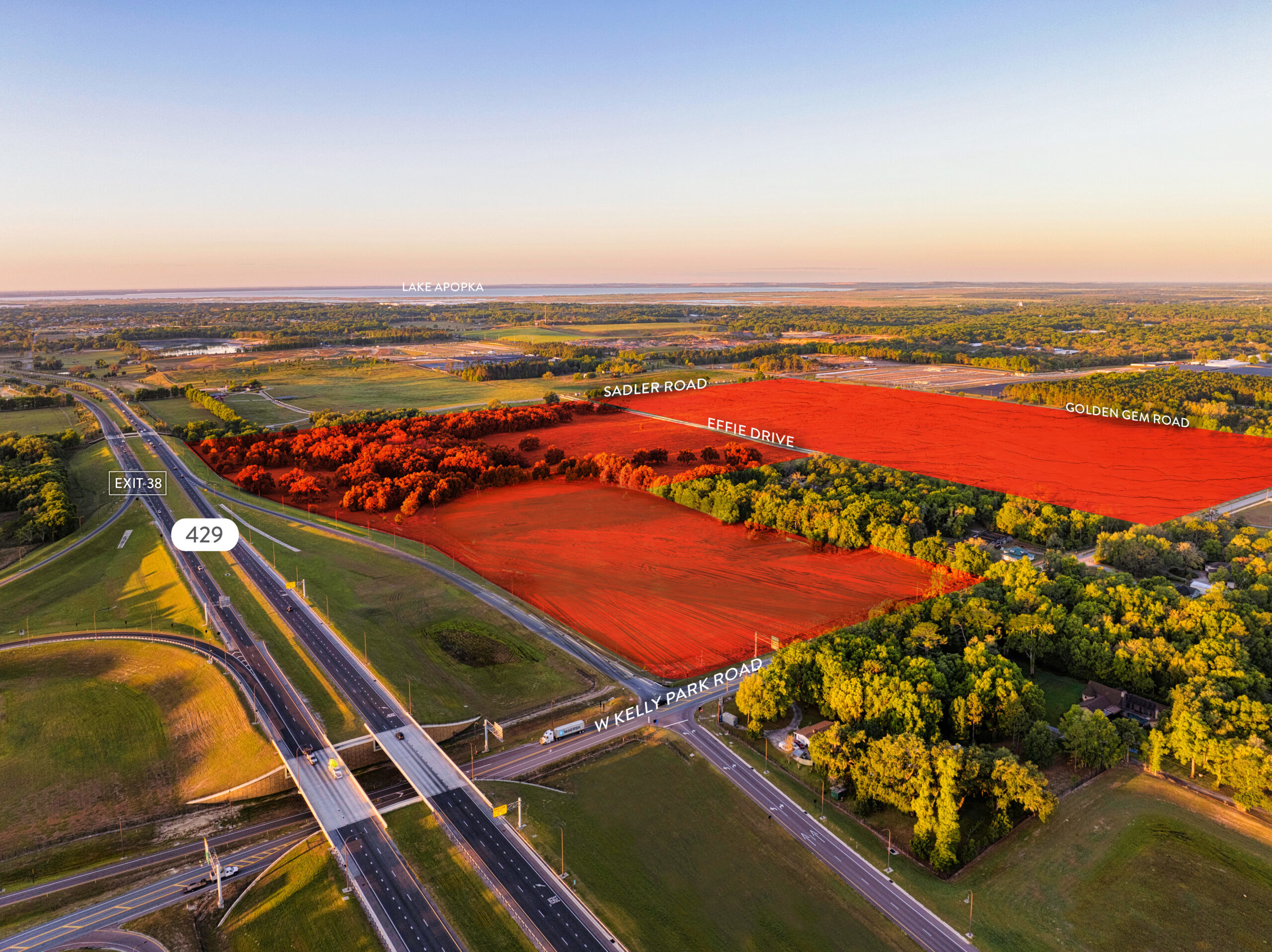 Drone shot of land with red highlighted rectangle area