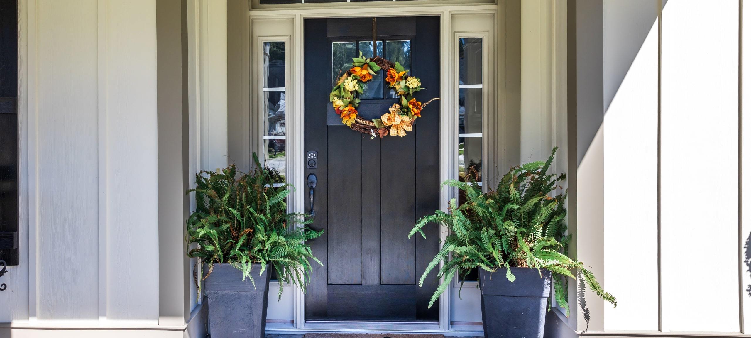 Front door of Craftsman style townhome, typical of Horizon West area