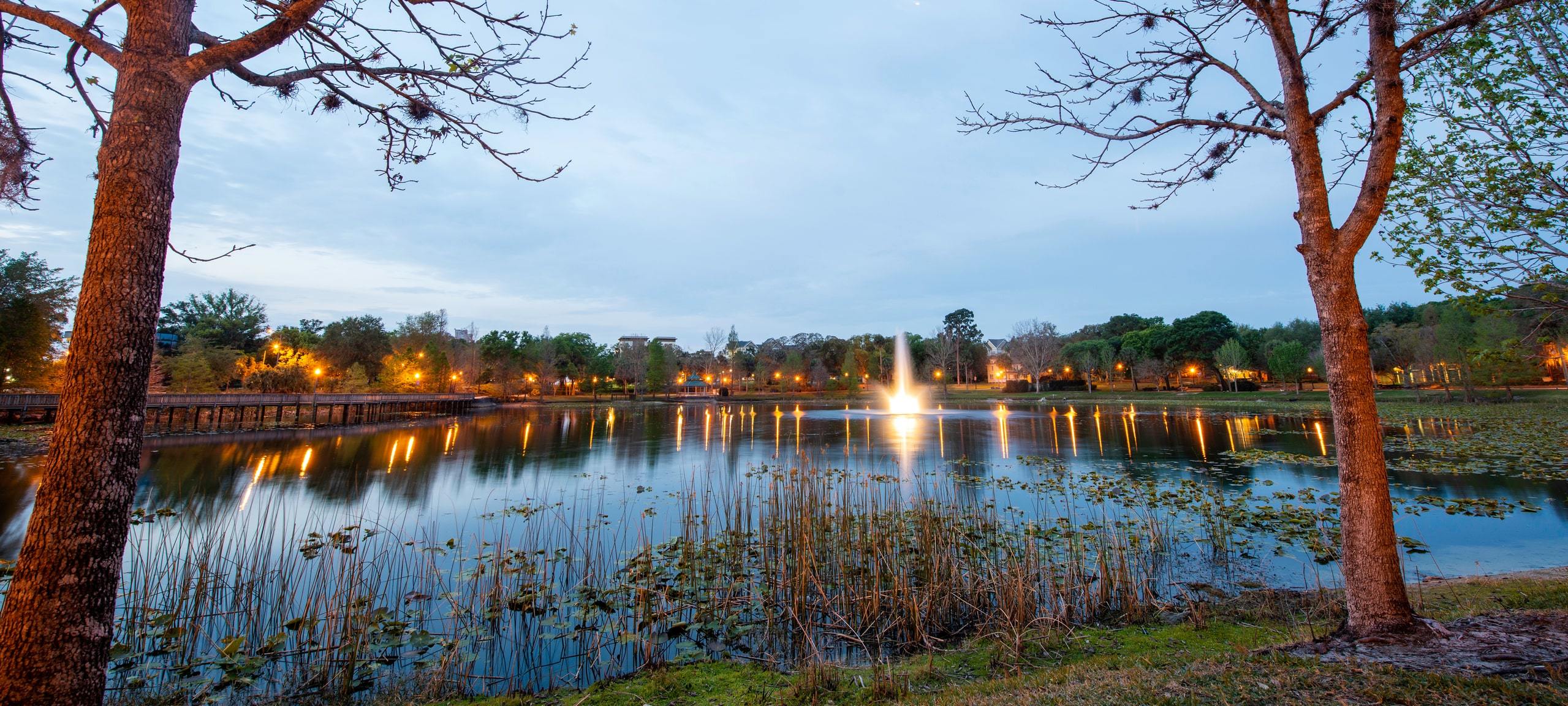 Fountain on Lake Lily during twilight in Maitland, FL