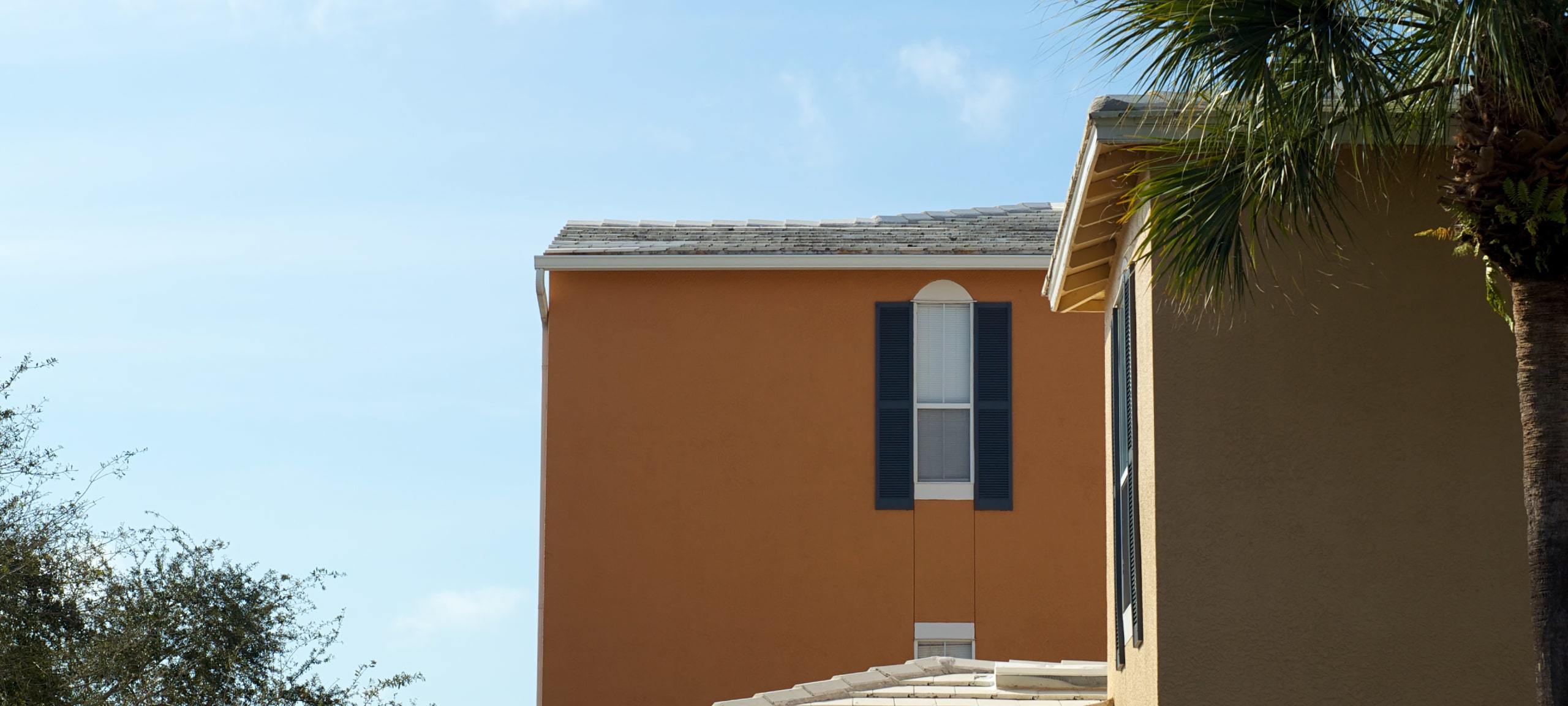 Top view of Mediterranean style stucco condo, typical of St. Cloud, FL
