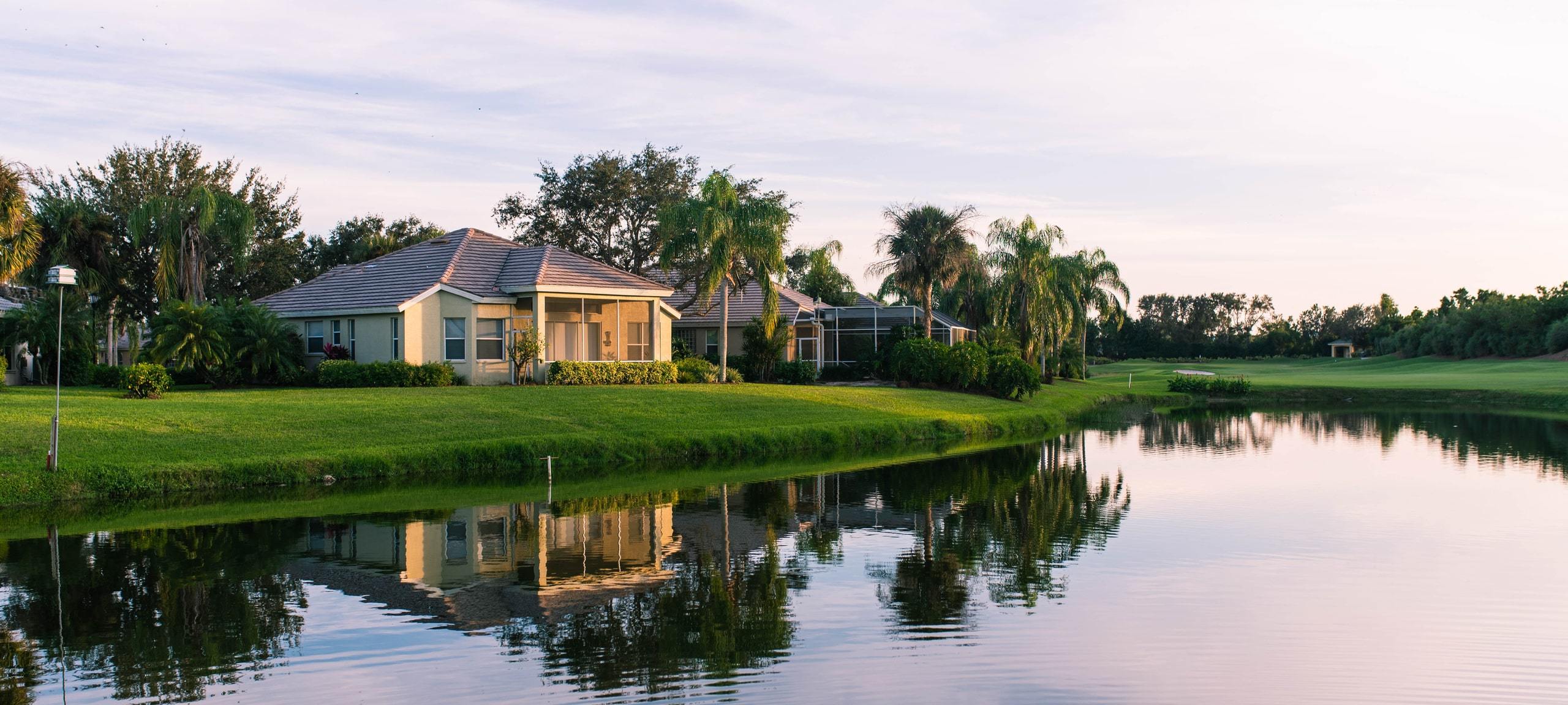 Home on manmade lake on golf course, Florida