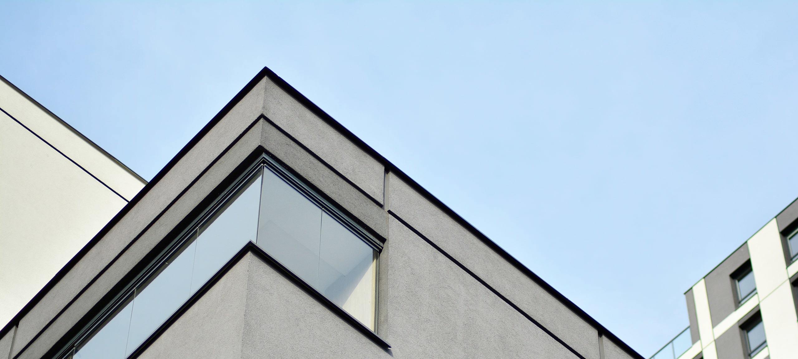 Upwards view of modern, loft style concrete building