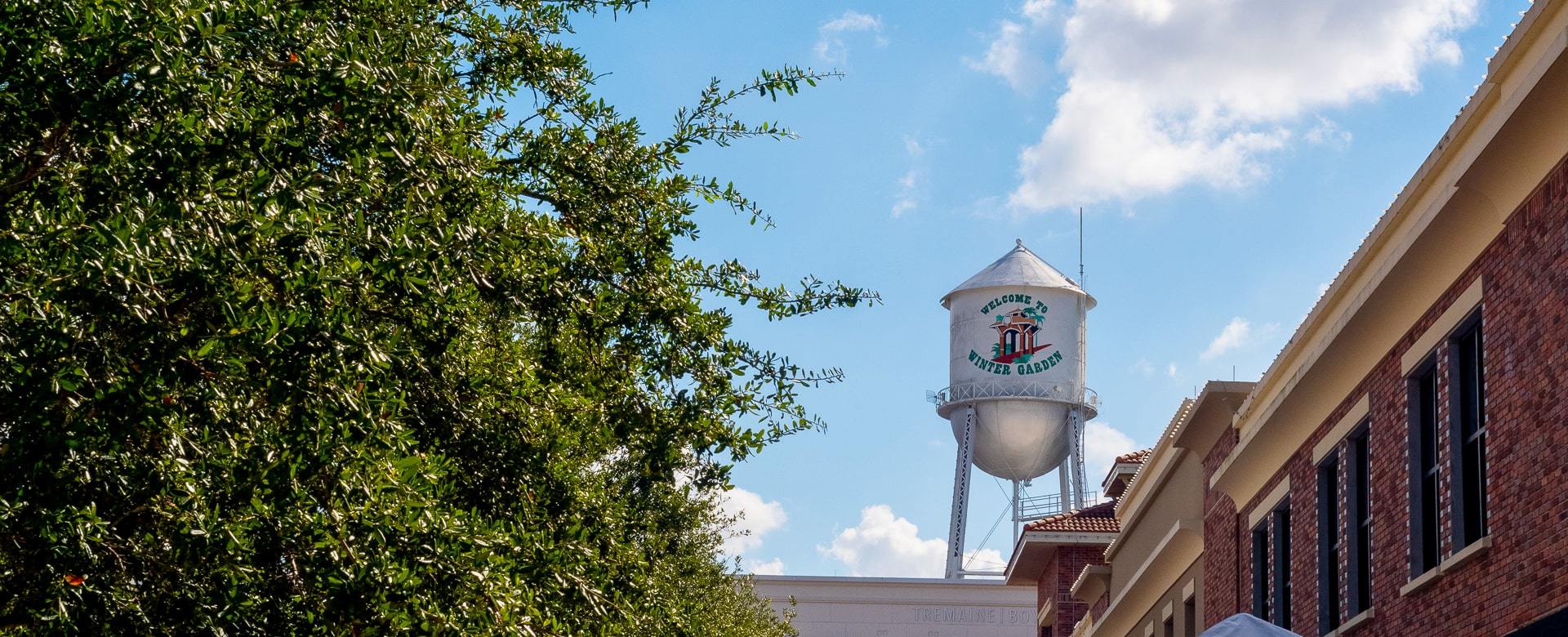 Winter Garden, FL water tower over sunny rooftops